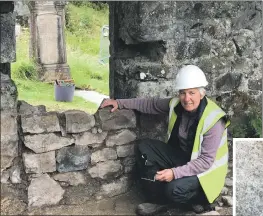  ??  ?? Dr Claire Ellis uncovers more of the past at Historic Kilbride, left, including this chunk of stone with the letter B carved into it.