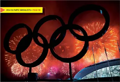  ??  ?? The Olympic Rings are silhouette­d as fireworks light up the sky during the closing ceremonies at the 2014 Sochi Winter Olympics on Sunday in Sochi, Russia.