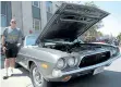  ?? RAY SPITERI/NIAGARA FALLS REVIEW ?? Bill Knox, of Fort Erie, shows his 1973 Dodge Challenger at the Cruising on the Q event in downtown Niagara Falls on Sunday.