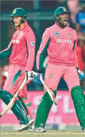  ?? AFP ?? Heinrich Klaasen (left) and Andile Phehlukway­o celebrate after South Africa beat India by five wickets in the fourth ODI at Wanderers on Saturday. India lead the series 31.