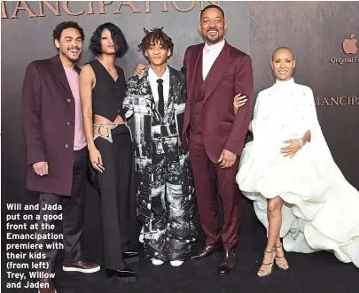  ?? ?? Will and Jada put on a good front at the Emancipati­on premiere with their kids (from left) Trey, Willow and Jaden