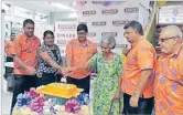  ?? Picture: SUPPLIED ?? Courts customers join in the celebratio­ns with the Courts management team during the launch of Courts big birthday promotion.