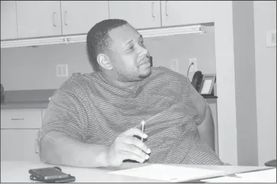  ?? Brittany Williams/News-Times ?? Building Your Brand: Business owner Markeith Cook is attentive during the “Building Your Brand” workshop Thursday at SouthArk’s Center for Workforce Developmen­t.