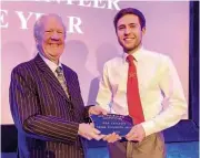  ??  ?? Above: Lord Faulkner presents the award to Phil Civil at the HRA awards ceremony in Birmingham on February 8, 2020. HRA