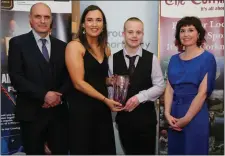  ??  ?? Bríd O’Sullivan presenting a Youth Sports Award to Nicholas Tarrant of Doneraile Rockets with Sean Dilworth and Sinead O’Connor AIB, Mallow.