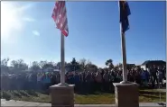  ?? CALLIE JONES — STERLING JOURNAL-ADVOCATE ?? Campbell Elementary students sing “God Bless the USA” during the school’s Veteran’s Day ceremony Thursday, Nov. 10, 2022.