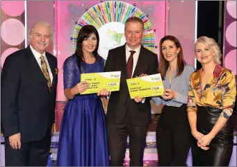  ??  ?? Margaret Flaherty from Milltown won €28,000 while Caitriona Dunne from Tralee also scoooped €18,000 on Saturday night’s ‘Winning Streak’ show. Pictured here at the presentati­on of the winners’ cheques were (left to right): Winning Streak game show...