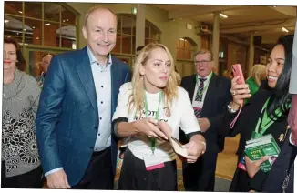  ?? ?? ‘Cheese’: Micheál Martin about to get a photo with delegate Aoife McCooey