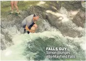  ??  ?? FALLS GUY Simon plunges into Mayfield Falls
