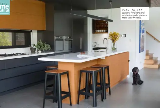  ??  ?? EASY-to-use systems for doors and cabinetry make kitchens more user-friendly.