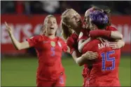  ?? CHRIS CARLSON - THE ASSOCIATED PRESS ?? U.S. players celebrate after a goal by midfielder Rose Lavelle, second from right, during the first half of a CONCACAF women’s Olympic qualifying soccer match against Mexico on Friday, Feb. 7, 2020, in Carson, Calif.