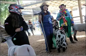  ?? BEA AHBECK/NEWS-SENTINEL ?? Belle Beglanger of Escalon is announced the winner during the costume contest during the San Joaquin AgFest 2019 at the San Joaquin Fairground­s in Stockton on Thursday.