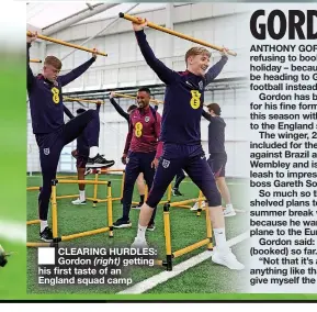 ?? ?? ■ CLEARING HURDLES: Gordon (right) getting his first taste of an England squad camp