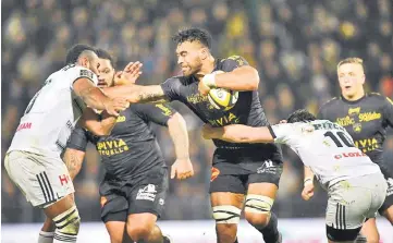  ??  ?? La Rochelle’s New Zealand flanker Victor Vito is tackled during the French Top 14 rugby union match La Rochelle vs Brive at the MarcelDefl­andre stadium in La Rochelle. — AFP photo