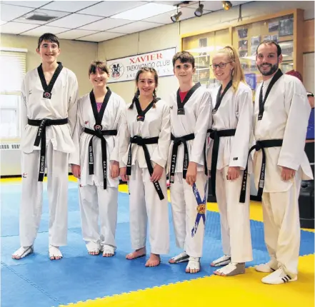  ?? Richard Mackenzie ?? Xavier Taekwondo Club athletes Ewan Macduff (left), Keira Macduff, Leah Grant, Cole Allen, and Rebekeah Pitts, as well as coach/instructor Jeremy Reeve, are off to Warren, Michigan for the Michigan-midwest Taekwondo Championsh­ips which takes place Dec. 1.
