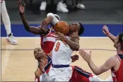  ?? FRANK FRANKLIN II — THE ASSOCIATED PRESS ?? The Knicks’ RJ Barrett is fouled by the Wizards’ Russell Westbrook, left, and Isaac Bonga on Thursday in New York.