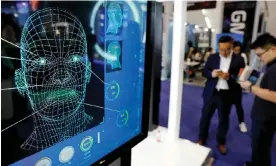  ?? ?? Facial recognitio­n software advertised at the Global Mobile Internet Conference in Beijing, April 2018. Similar surveillan­ce is in use in parts of China by traffic police. Photograph: Damir Šagolj/Reuters