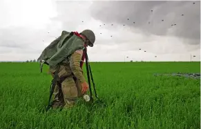  ?? A re-enactor just after landing on DZ-K dressed in authentic WW2 US Airborne uniform ??