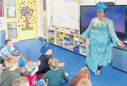  ?? CONTRIBUTE­D ?? Nwamaka Onowotu presents on Nigerian culture to Mrs. Shea’s Grade three class at Gander Academy. The school recently celebrated Multicultu­ral Day.