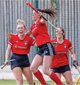  ?? ?? Firebrands’ Lizzie Cook celebrates with team-mates after scoring in a 3-3 draw against Clifton Robinsons 2nds