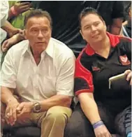  ?? Picture: SUPPLIED ?? Action film star Arnold Schwarzene­gger with Martial Arts SA president Louise Viviers