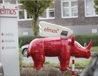  ?? ?? A winged ‘Elmos rhinoceros’ stands in front of the chip factory Elmos Semiconduc­tor SE offices in Dortmund, Germany, on Nov. 8, 2022.