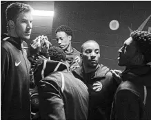  ?? CANADIAN PRESS FILE PHOTO ?? Raptors players huddle outside the locker-room before their NBA game against the Oklahoma City Thunder in Toronto on March 18.