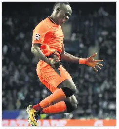  ??  ?? JUMP FOR JOY Sadio Mane was hat-trick hero in 5-0 thumping of Porto