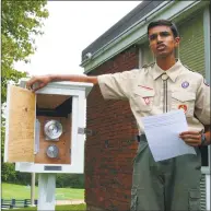  ?? Stephen Coulter / Hearst Connecticu­t Media ?? Ridgefield Boy Scout Ajay Natarajan of Troop 76 discusses what’s inside the weather station he built for Scotland Elementary School students.