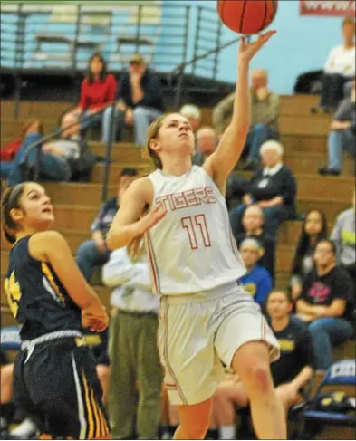  ?? BARRY TAGLIEBER - FOR DIGITAL FIRST MEDIA ?? Fleetwood’s Alexis Schoener scores a layup against Muhlenberg during a BCIAA quarterfin­al on Feb. 11.