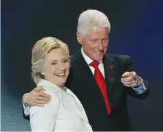  ?? (Mike Segar/Reuters) ?? US DEMOCRATIC PRESIDENTI­AL nominee Hillary Clinton stands with her husband, former president Bill Clinton, after accepting the nomination on the final night of the Democratic National Convention in Philadelph­ia, Pennsylvan­ia, last month.