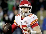  ?? AP/ELAINE THOMPSON ?? Kansas City Chiefs quarterbac­k Patrick Mahomes watched his team squander another opportunit­y to clinch the AFC’s top seed as it lost 38-31 to Seattle on Sunday. “We’ve been in every game that we’ve lost, but we have to find ways to win,” he said.