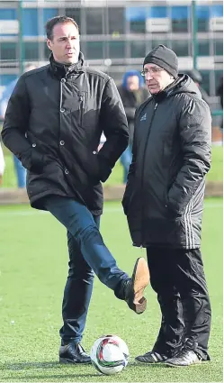  ?? SNS. ?? Malky Mackay, left, with SFA performanc­e developmen­t manager Neil MacKintosh, revealed the plan yesterday.