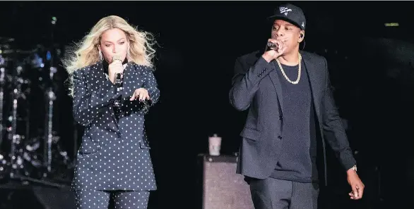  ?? MATT ROURKE/AP FILES ?? Beyonce and Jay-Z, performing as The Carters, released their debut album in June, completing the duo’s trilogy of albums about their marriage that includes Lemonade and 4:44. Music’s greatest power couple is scheduled to bring the husband-and-wife show to B.C. Place on Oct. 2.