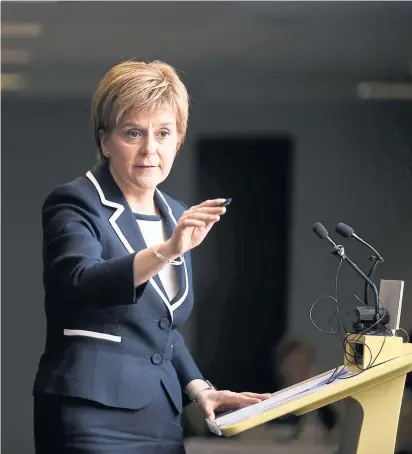  ??  ?? Nicola Sturgeon has attacked Theresa May and the Tories for the chilling tone of their blueprint for a postBrexit Britain Photograph: Markus Schreiber/AP Photos