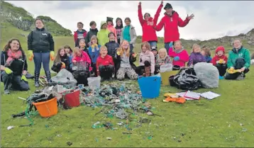  ??  ?? The group picked up masses of litter during their beach clean.