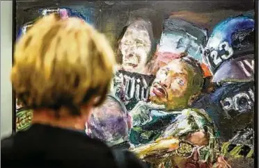  ??  ?? Johannes Heisigs Gemälde „Via Dolorosa“() stellt Martin Luther King in den Pegida-pöbel hinein und übertrug damit ein Passionsmo­tiv ins Heute. Fotos: Sascha Willms ()