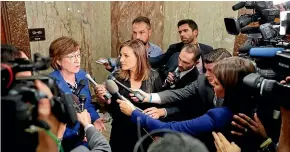  ?? AP ?? Senatgor Susan Collins, R-Maine, speaks to members of the media outside her office on Capitol Hill in Washington. She says if Supreme Court nominee Brett Kavanaugh has lied about the sexual assault allegation against him from high school, it would be ‘‘disqualify­ing’’.