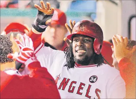  ?? Luis Sinco Los Angeles Times ?? SLUGGING OUTFIELDER Vladimir Guerrero played seven full seasons with the Montreal Expos, six with the Angels.