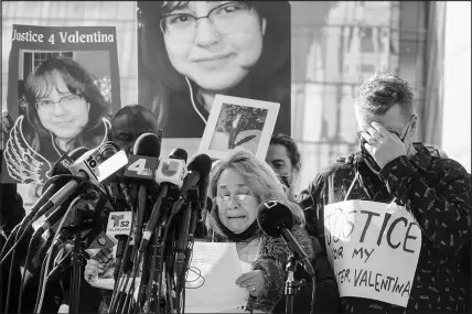  ?? RINGO H.W. CHIU / AP ?? Soledad Peralta and Juan Pablo Orellana Larenas, the parents of Valentina Orellana-peralta, attend a news conference Tuesday outside the Los Angeles Police Department headqurate­rs. The parents of Valentina Orellana-peralta, the 14-year-old girl killed by a stray bullet fired by an LAPD officer at a North Hollywood clothing store last week, and their attorneys led a news conference to discuss the family’s demand for transparen­cy from the police department.