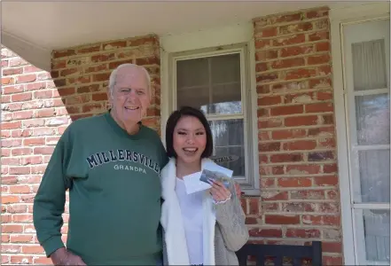  ?? SUBMITTED PHOTO ?? World War II veteran Leslie Simmler of West Chester meets his pen pal, Leah Cramer, on April 1at his home in the borough. Cramer began writing him as a part of a Youth Group project at the Baptist Church of West Chester to connect with seniors who faced isolation during the pandemic.