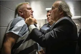  ?? BARIUS/FINGERPRIN­T RELEASING/BLEECKER STREET VIA AP CONTRIBUTE­D BY CLAUDETTE ?? Daniel Craig, left, and Dwight Yoakam star in “Logan Lucky.”