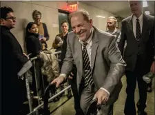  ?? BEBETO MATTHEWS - THE ASSOCIATED PRESS ?? Harvey Weinstein, center, leaves Manhattan’s Criminal Court after a key accuser in his rape trial testified Friday Jan. 31, in New York.