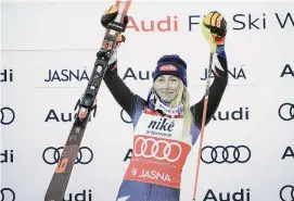  ?? Photos by Paul Brechu/Getty Images ?? Mikaela Shiffrin celebrates after winning the Audi FIS Alpine Ski World Cup women’s slalom on Sunday.