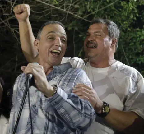  ?? ISMAEL FRANCISCO/THE ASSOCIATED PRESS ?? Antonio Guerrero, left, and Ramon Labanino, two of the three Cubans released under a prisoners swap agreement with the U.S. on Wednesday.