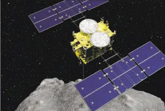  ?? Japan Aerospace Exploratio­n Agency ?? This computer graphics image shows the Hayabusa2 spacecraft above the asteroid Ryugu. A small capsule from the spacecraft recently landed in the Australian Outback.