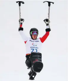  ?? GETTY IMAGES/FILES ?? Team Canada’s Josh Dueck lets out a ‘whoop!’ after his gold-medal run in men’s combined sitting super-G at the 2014 Paralympic Winter Games in Sochi, Russia.