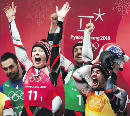  ?? DAN ISTITENE/GETTY IMAGES ?? Four years of team-relay luge frustratio­n came to an end at Olympic Sliding Centre in Pyeongchan­g, South Korea, Thursday as Team Canada — Alex Gough, second from left, Sam Edney, Justin Snith and Tristan Walker (not pictured) — captured a silver medal.