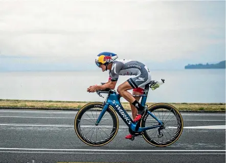  ??  ?? Braden Currie speeds along the Lake Taupo waterfront yesterday.