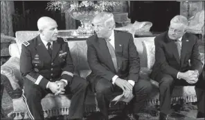  ?? AP/SUSAN WALSH ?? President Donald Trump talks Monday with Army Lt. Gen. H.R. McMaster (left) and retired Army Lt. Gen. Keith Kellogg at Trump’s Mar-a-Lago estate in Palm Beach, Fla. McMaster was named new national security adviser Monday, and Kellogg, who had been...